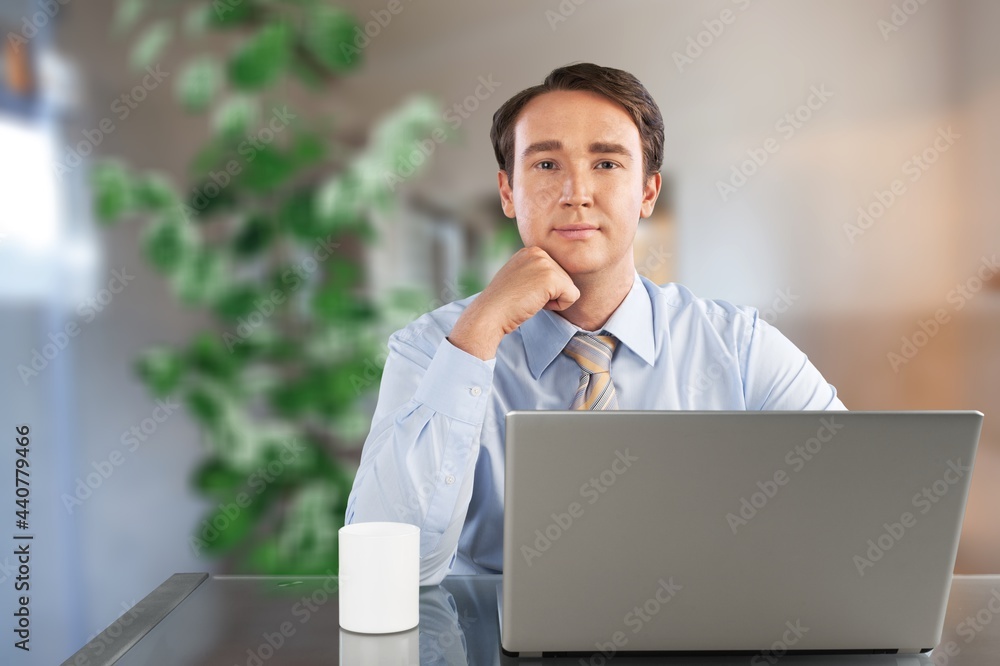 Poster young man work using computer hand typing laptop.