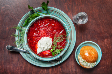Traditional beetroot soup borscht with fresh green parsley