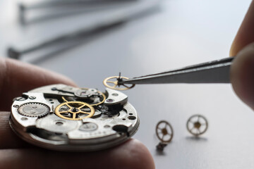 Watchmaker repair mechanical watches. Gears repair. Watch repair process