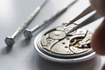 Watchmaker repair mechanical watches. Gears repair. Watch repair process