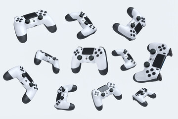 Flying gamer joysticks or gamepads on white background