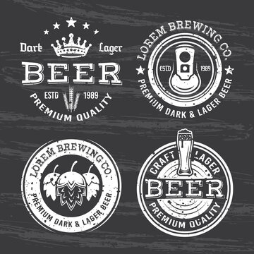 Beer and brewery set of four vector white emblems, labels and badges isolated on dark chalkboard with removable grunge texture