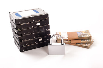 Cyber crime. Internet cyber security concept with a padlock on computer hard disc. Ransomware,...