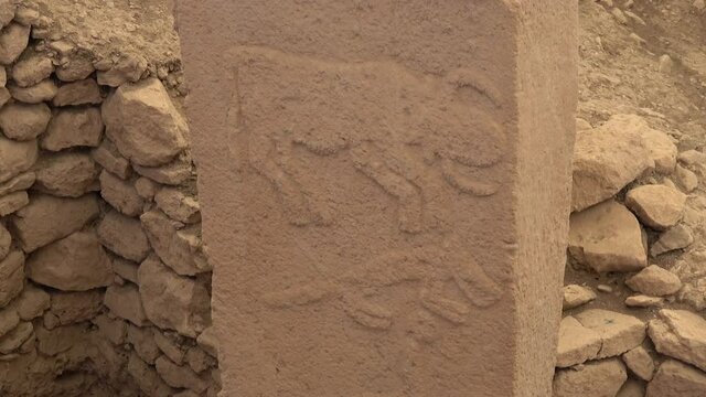 Gobeklitepe, Sanliurfa, Turkey - 15th of June 2021: 4K Animal figures carved on stone pillars
