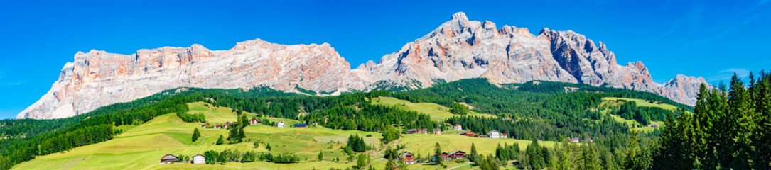 Fototapeta na wymiar Panoramic view of magical Dolomite peaks in Fanes-Sennes-Braies natural park at South Tyrol, Italy, blue sky, wide angle