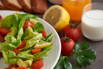 top view mix fruit and vegetable salad on white dish. .Healthy vegetable salad. Diet menu. Top view.