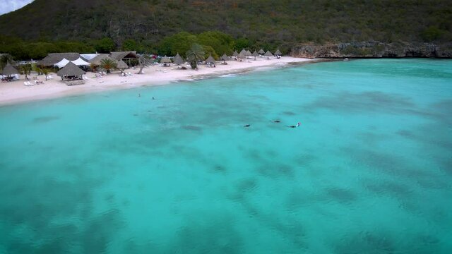  Cas Abou Beach on the Caribbean island of Curacao, Playa Cas Abou in Curacao Caribbean tropical white beach with the blue ocean. drone footage