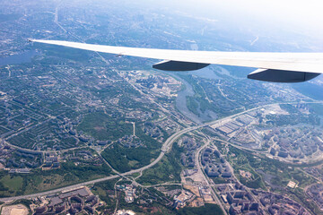 Wing of an airplane in the sky.