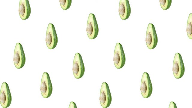 pattern with many halfs avocados rotating close-up on a white background. seamless looping animation with copy space