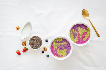 Smoothie bowles with chia seeds and strawberries, top view