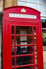 Fototapeta na wymiar Red phone boots in south of England, United Kingdom