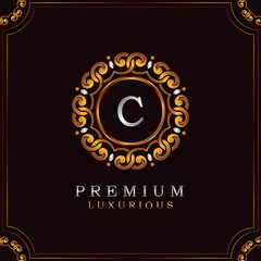 Golden Premium Luxury Mandala Badge Letter C Logo Design. Elegance Ornate Decoration Mandala Badge On Golden Frame .