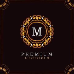 Golden Premium Luxury Mandala Badge Letter M Logo Design. Elegance Ornate Decoration Mandala Badge On Golden Frame .