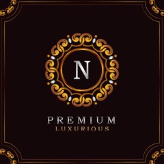 Golden Premium Luxury Mandala Badge Letter N Logo Design. Elegance Ornate Decoration Mandala Badge On Golden Frame .