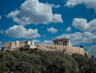 Parthenon on Acropolis of Athens Greece, under blue sky with some white clouds