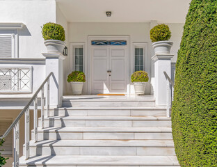 contemporary house white marble stairs and entrance door, Athens Greece