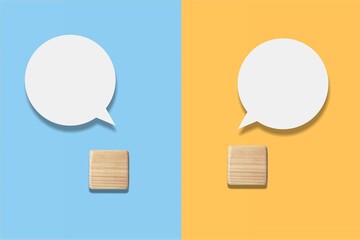 Two wooden cubes with a pattern of speech bubbles