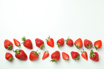 Fresh tasty strawberry with leaves on white background