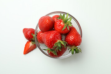 Bowl of fresh strawberry on white background