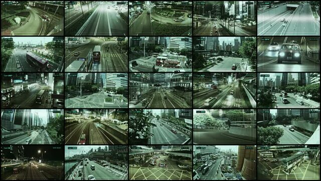 Cctv camera monitoring vehicle and highway roads in Hong Kong city.