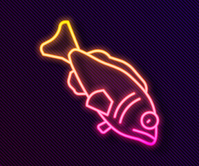 Glowing neon line Fish icon isolated on black background. Vector