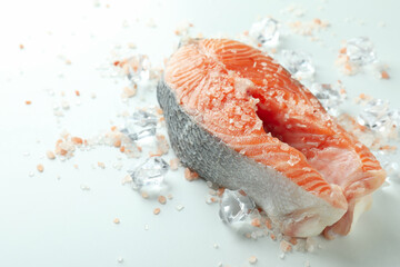 Fresh raw salmon and spices on white background