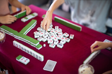 People playing mahjong traditional Chinese board game - 440813819