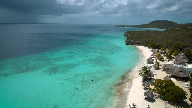  Cas Abou Beach on the Caribbean island of Curacao, Playa Cas Abou in Curacao Caribbean tropical white beach with the blue ocean. drone footage