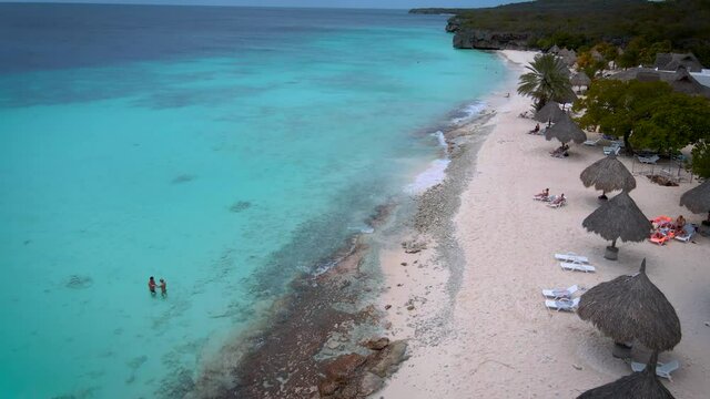  Cas Abou Beach on the Caribbean island of Curacao, Playa Cas Abou in Curacao Caribbean tropical white beach with the blue ocean. drone footage