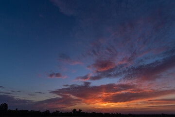 Fototapeta na wymiar Beautiful clouds on blue sky after sunset
