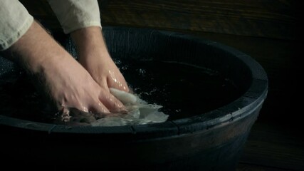 Servant Washes Clothing In Tub