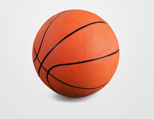 New orange basketball ball on the floor