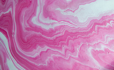 Pink-and-white paint stains. Abstract background with marble effect