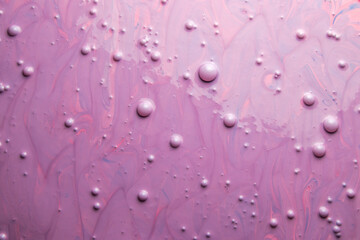 Pink paint background with bubbles. Abstract background