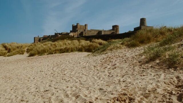 Scenic view of Bamburgh Castle, dating to 11th century and the seat of the former Kings of Northumbria, Northumberland, England, UK