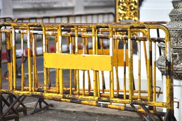 Steel barricades blocking traffic on the road
