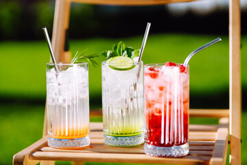Summer cocktails. Alcoholic cocktail with ice and citrus fruits. Summer holiday tropical concept.
