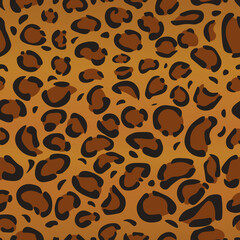 Leopard or Jaguar seamless pattern. Cheetah fur texture. Design for backgrounds, fabric, wallpaper, textile. Vector illustration of animal print.	
