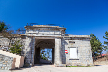 Fototapeta na wymiar ancient stone gate in Foros,