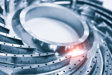 Steel blades of turbine propeller. Close-up view. Selected focus on foreground, engineering...