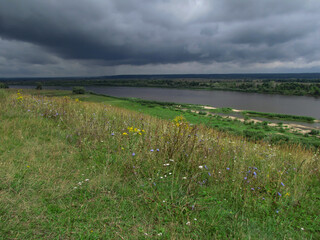 Panoramic view of the Oka river with worsening weather, Ryazan region, Russia