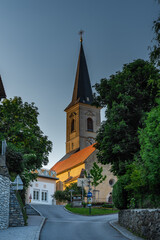 Fototapeta na wymiar Pfarrkirche Sankt Radegundis church in Austria in sunrise morning