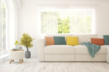 White living room with sofa and summer landscape in window. Scandinavian interior design. 3D illustration