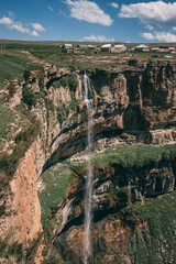 Dagestan traditional highland village Danukh with green terraces in Caucasus Mountains. Rural mountain scenery in Russia