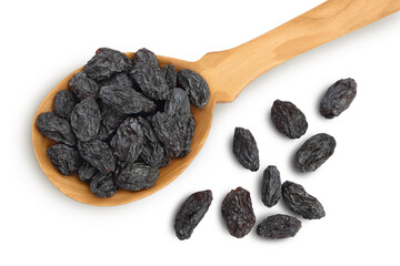 Black raisin iin wooden spoon solated on white background with clipping path. Top view. Flat lay