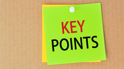 phrase key points written on green paper and pinned on corkboard, concept