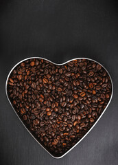 coffee beans close up. Top view. Texture of roasted brown coffee beans.Top view with copy space.