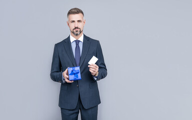 confident businessman man in suit share present box and hold credir or debit card, purchase.