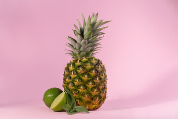 Fresh Ripe Pineapple against a pink background. Hello, Summer concept.