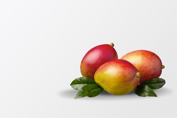 Set with sweet ripe mangoes on a desk